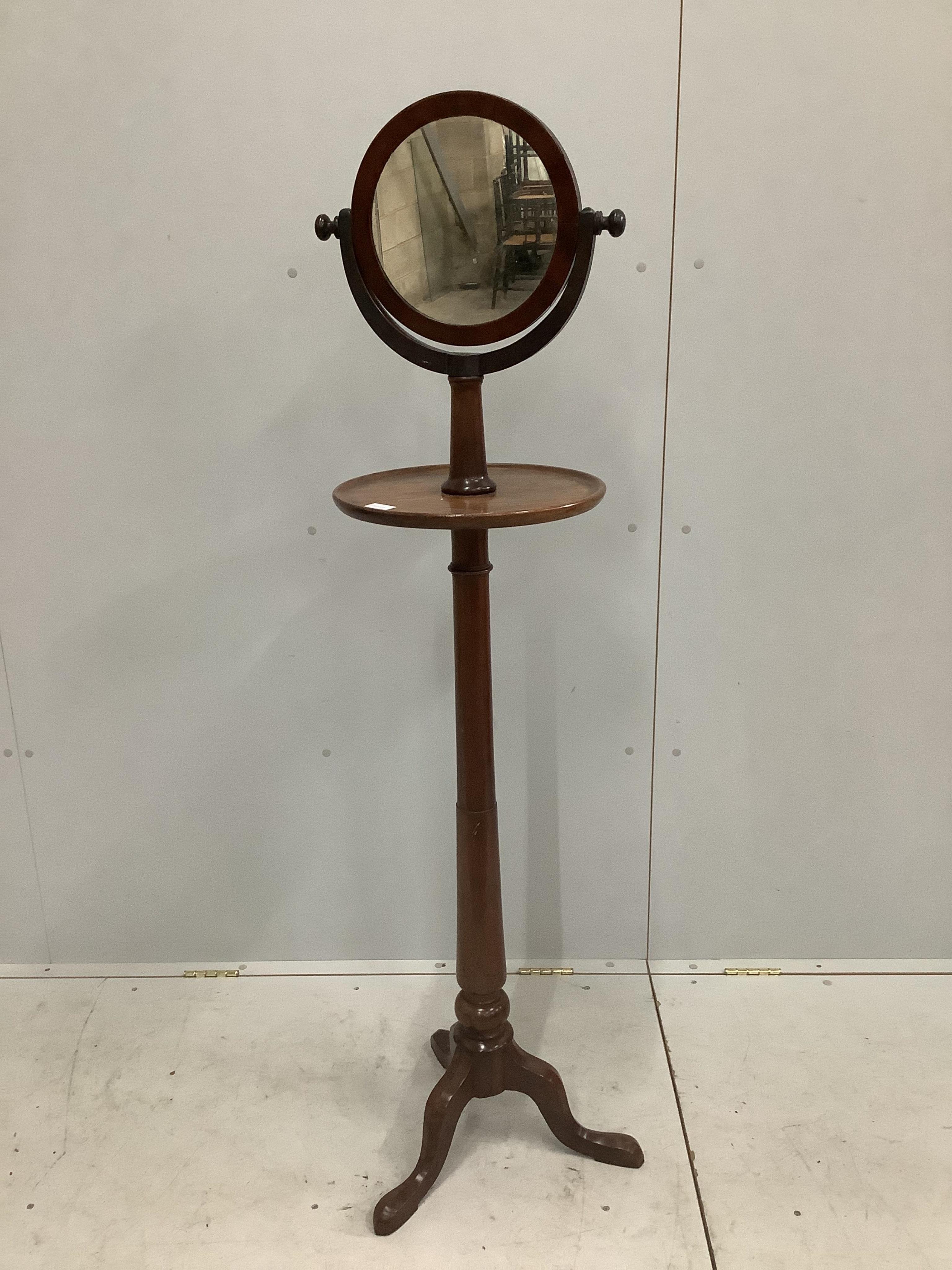 A Victorian mahogany shaving stand, height 154cm. Condition - fair